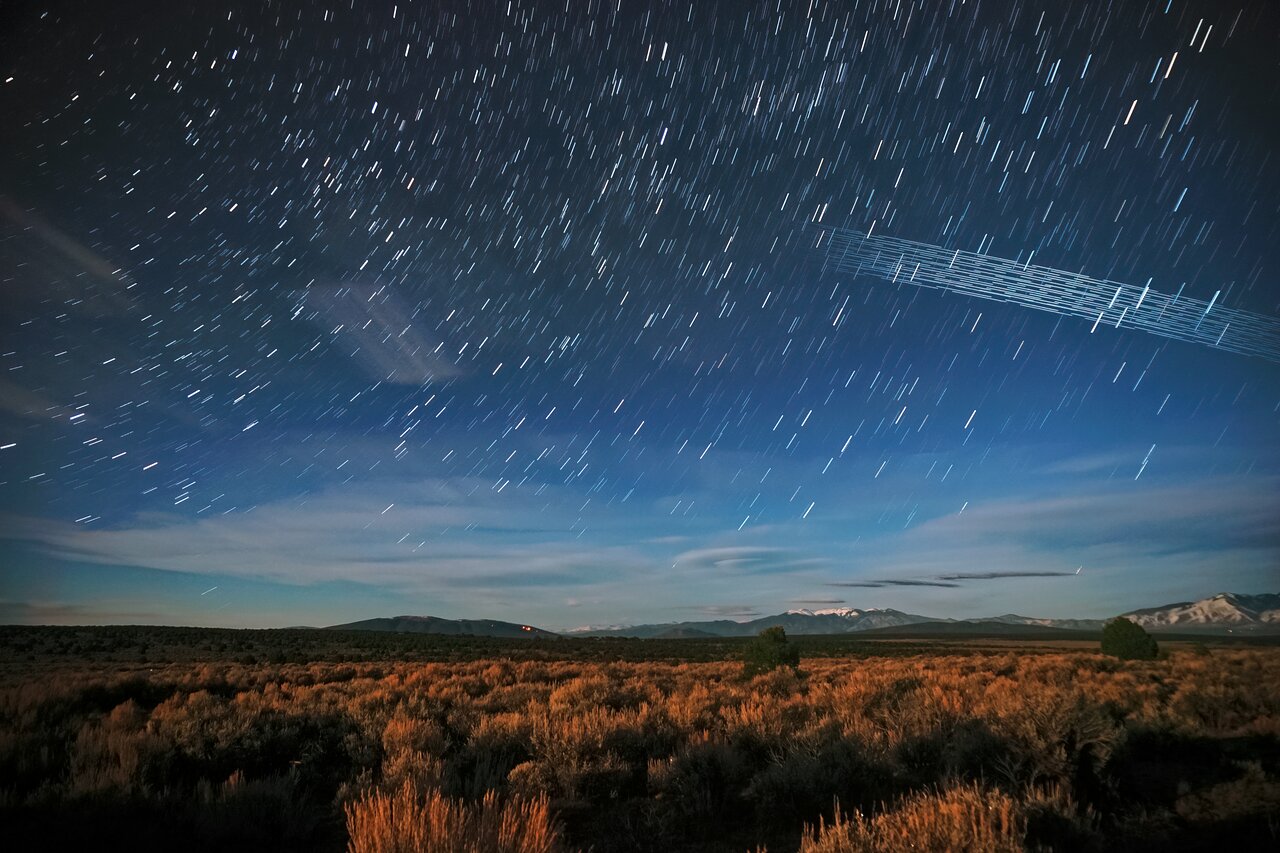 Starlink satellites streaking across the night sky over Carson National Forest, New Mexico, shortly after launch.